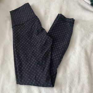 Lululemon size 4 logo print inseam 25 inch worn once.